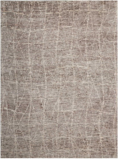 Taupe woven area rug with soft texture and subtle abstract geometric lattice pattern.