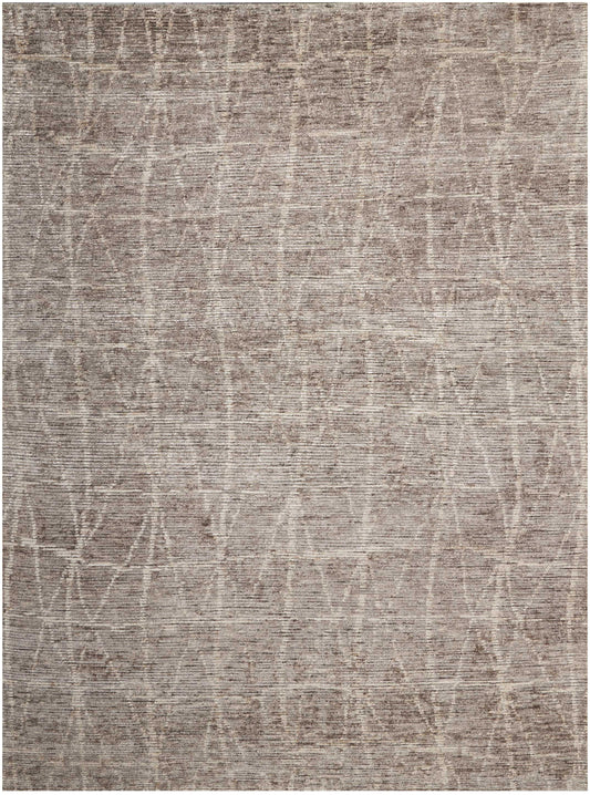 Taupe woven area rug with soft texture and subtle abstract geometric lattice pattern.