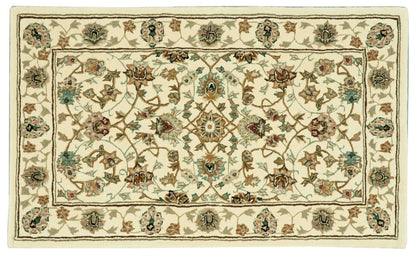 Ivory Persian-style floral area rug with scrolling blue, brown and pink blossoms; rectangular wool-blend, traditional decor, 3' x 4'.