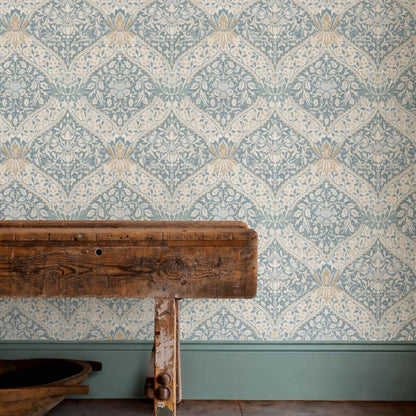 Norbury Wallpaper by Morris & Co. in Woad and Linen featuring an elegant ogee damask pattern with detailed floral borders, leafy motifs, and subtle linen-inspired texture. A sophisticated Arts & Crafts heritage wallpaper design inspired by William Morris style, perfect for traditional and modern luxury interiors including bedrooms, living rooms, dining rooms, and studies.