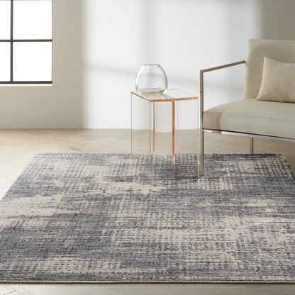 Blue-gray distressed area rug.