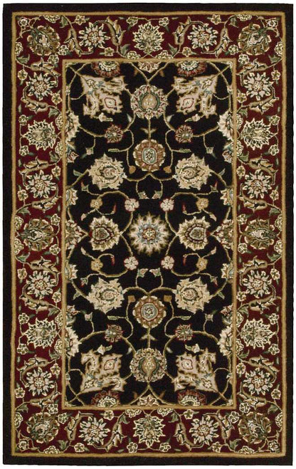 Persian-inspired area rug: black central field with ivory floral medallions and gold accents, burgundy border with cream flowers.