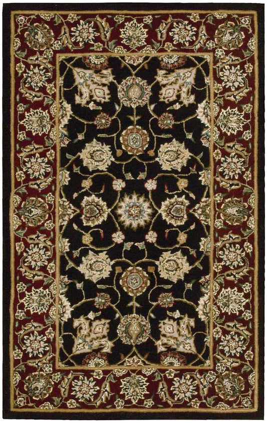 Persian-inspired area rug: black central field with ivory floral medallions and gold accents, burgundy border with cream flowers.