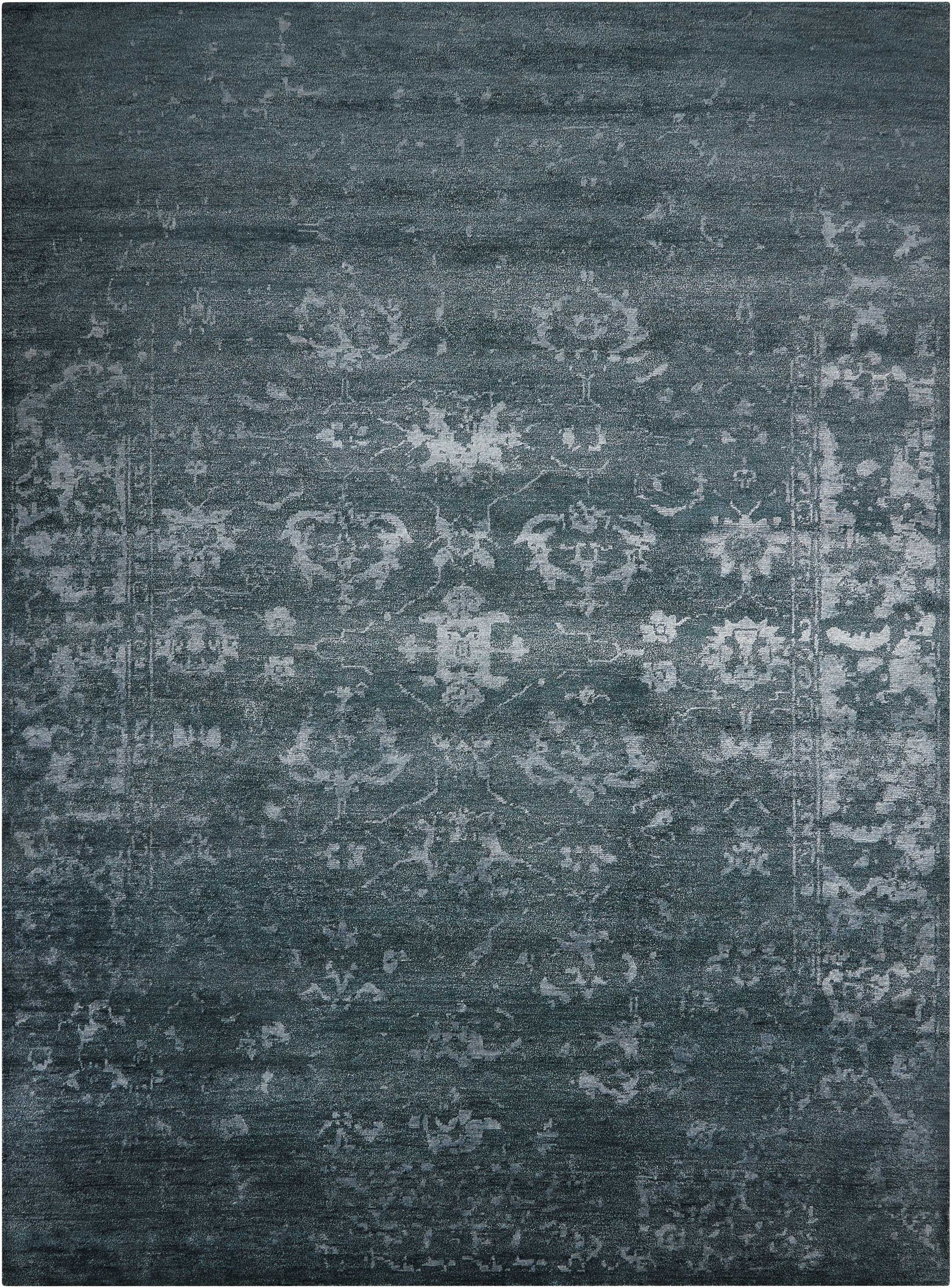 Blue-gray distressed oriental rug with faded Persian medallion pattern, vintage-style living room area rug.