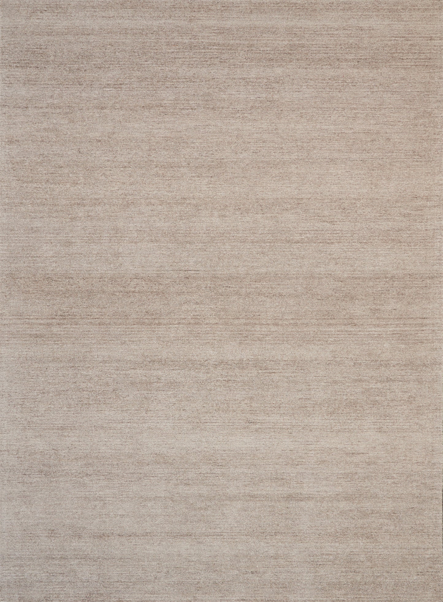 Beige textured flat-weave rug with subtle horizontal striations; warm neutral home decor.
