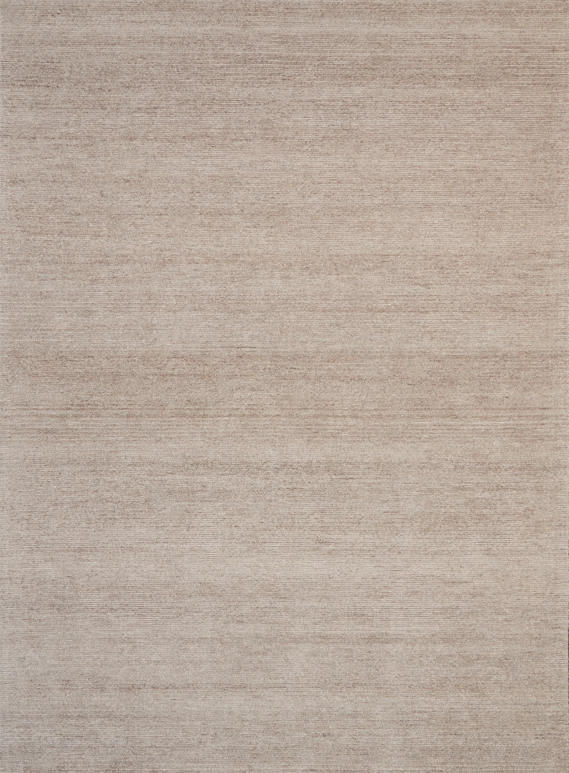 Beige textured flat-weave rug with subtle horizontal striations; warm neutral home decor.