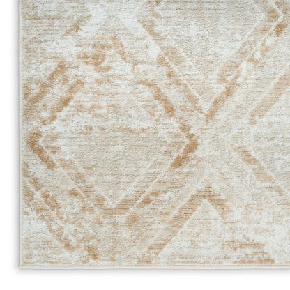 Beige area rug with cream background & light tan diamond geometric pattern, plush texture.