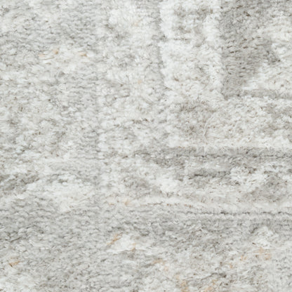 Soft light gray shag rug with cream flecks and a plush, textured surface for modern living spaces.