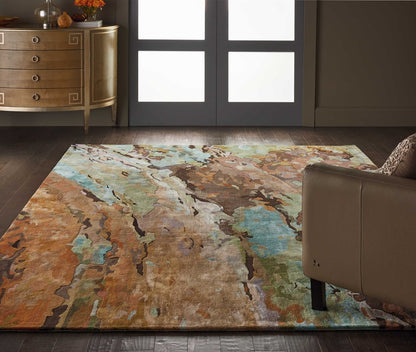8’ x 10’ Nourison Prismatic multicolor abstract area rug featuring vibrant jewel tones, modern artistic brushstroke pattern, large contemporary living room rug, luxury statement carpet for dining room, bedroom, or open concept home décor.