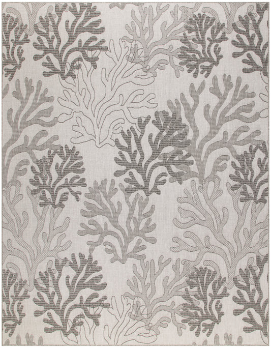 Neutral beige rug with gray coral pattern; organic coastal motif in woven textile for living room decor.