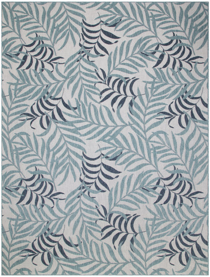 Blue-green palm leaf rug on light gray background; tropical botanical pattern, modern textile accessory for living spaces.