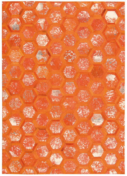 Bold orange hexagonal honeycomb pattern with white distressed patches; decorative rug.
