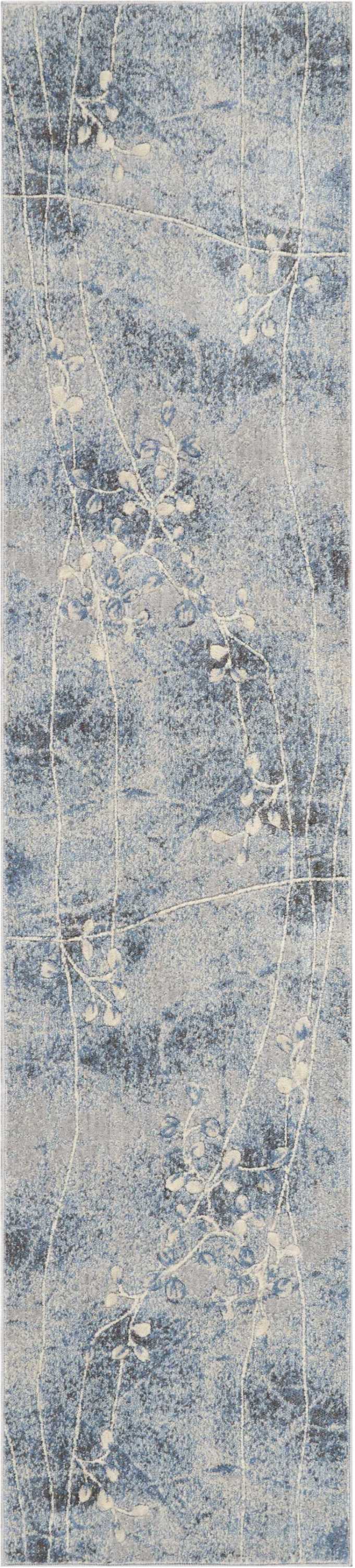 Blue-gray rectangular runner rug with white botanical vine pattern and a distressed texture.
