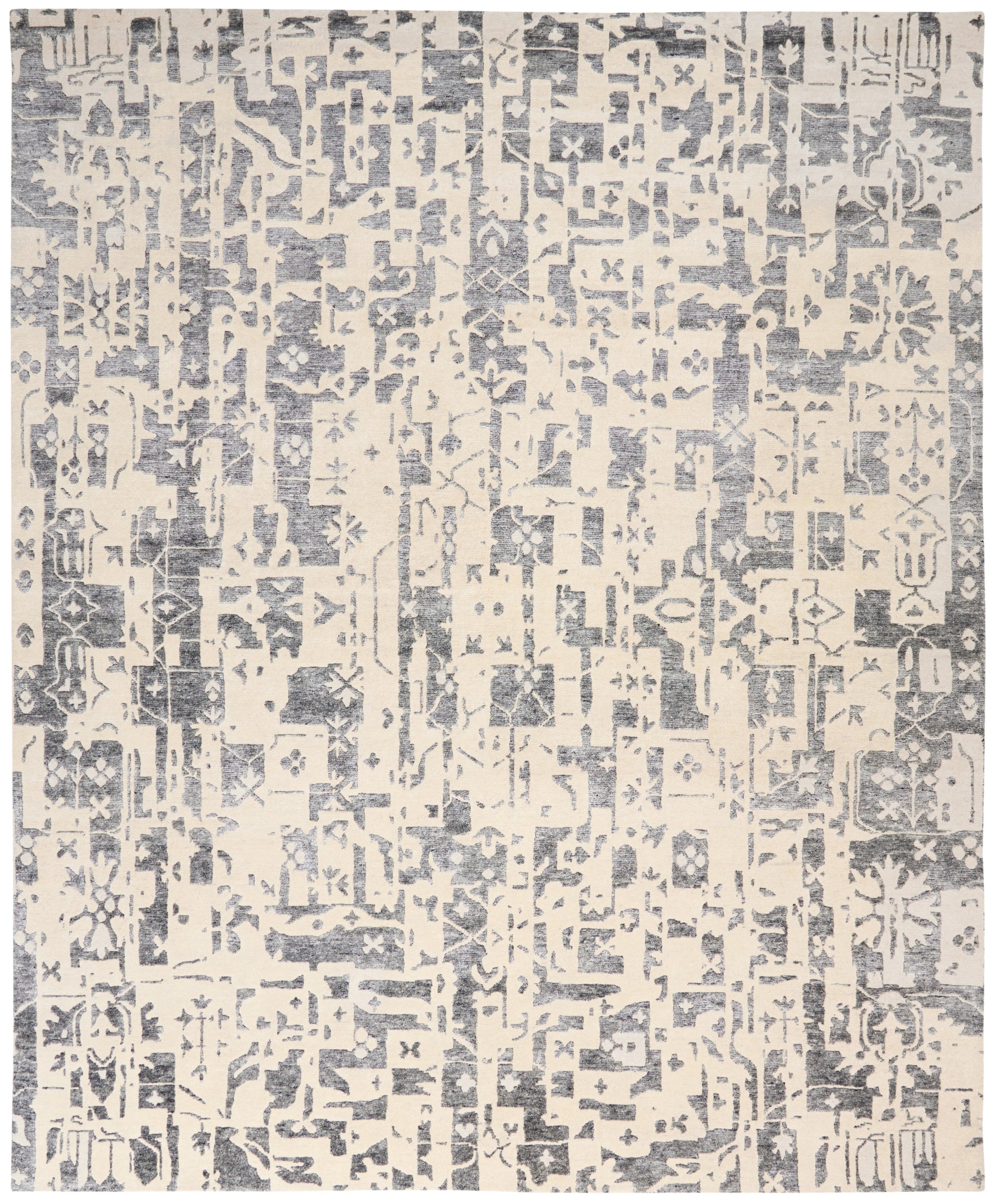 Cream-beige rug with blue-gray distressed geometric pattern; modern tribal style for living room floor.
