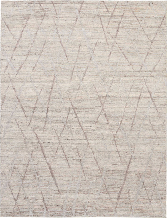 Beige woven area rug with soft taupe geometric lines forming subtle intersecting triangles.