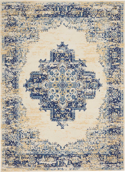 Blue and beige distressed Persian-style area rug with a central ornate medallion and intricate border.