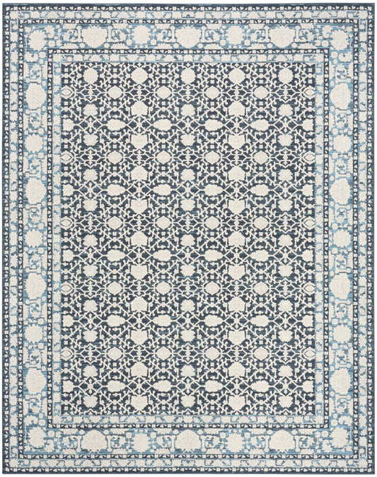 Rectangular area rug with navy field and ivory floral lattice, bordered by light blue borders in a Persian-inspired pattern.