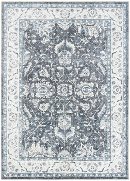 Rectangular blue-gray oriental rug with intricate ivory floral patterns and a light border.