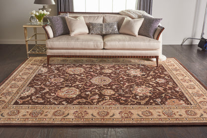 Large red-brown Persian-style rug on the floor in a living room.