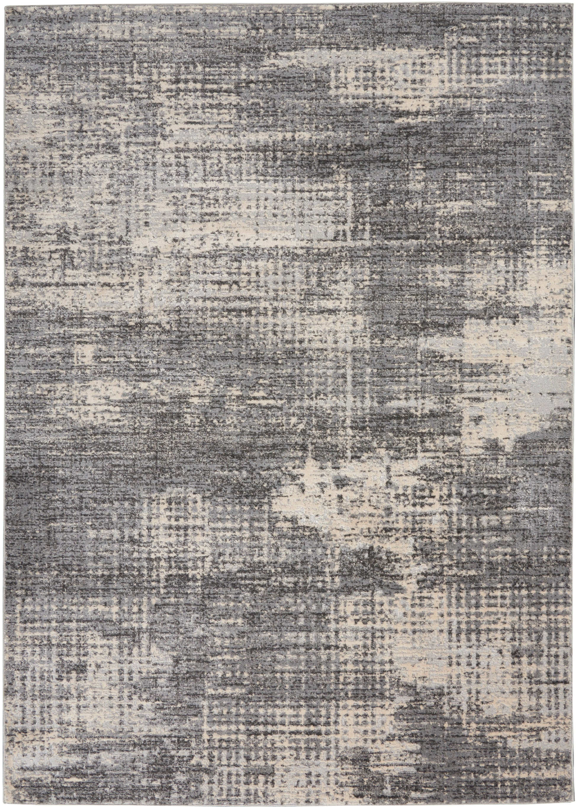 Rectangular area rug with a distressed gray and ivory abstract pattern; soft pile, modern chic.