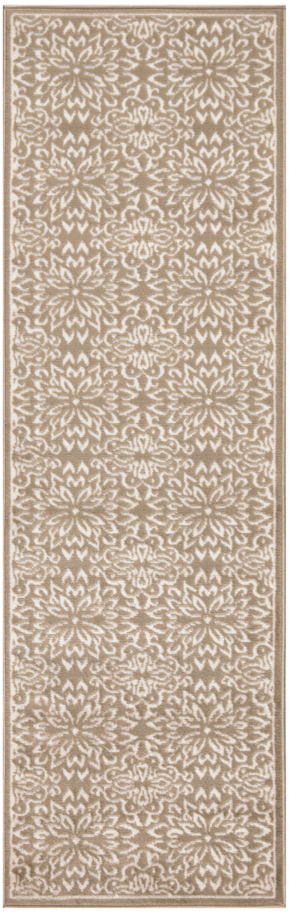 Long beige runner rug with an intricate white damask motif and a narrow border.