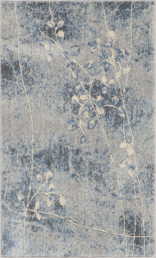 Rectangular blue-gray distressed rug with cream botanical vine and leaves, modern vintage style.