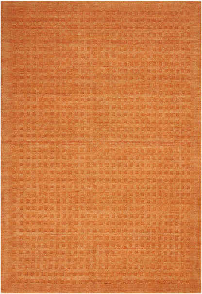 Orange flat-weave rug, 7' x 10', with a subtle grid/checker pattern and a textured weave in warm terracotta tones.