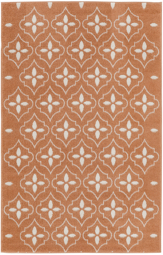 Terracotta rug with cream quatrefoil trellis pattern; woven rectangular rug for living room or entryway.