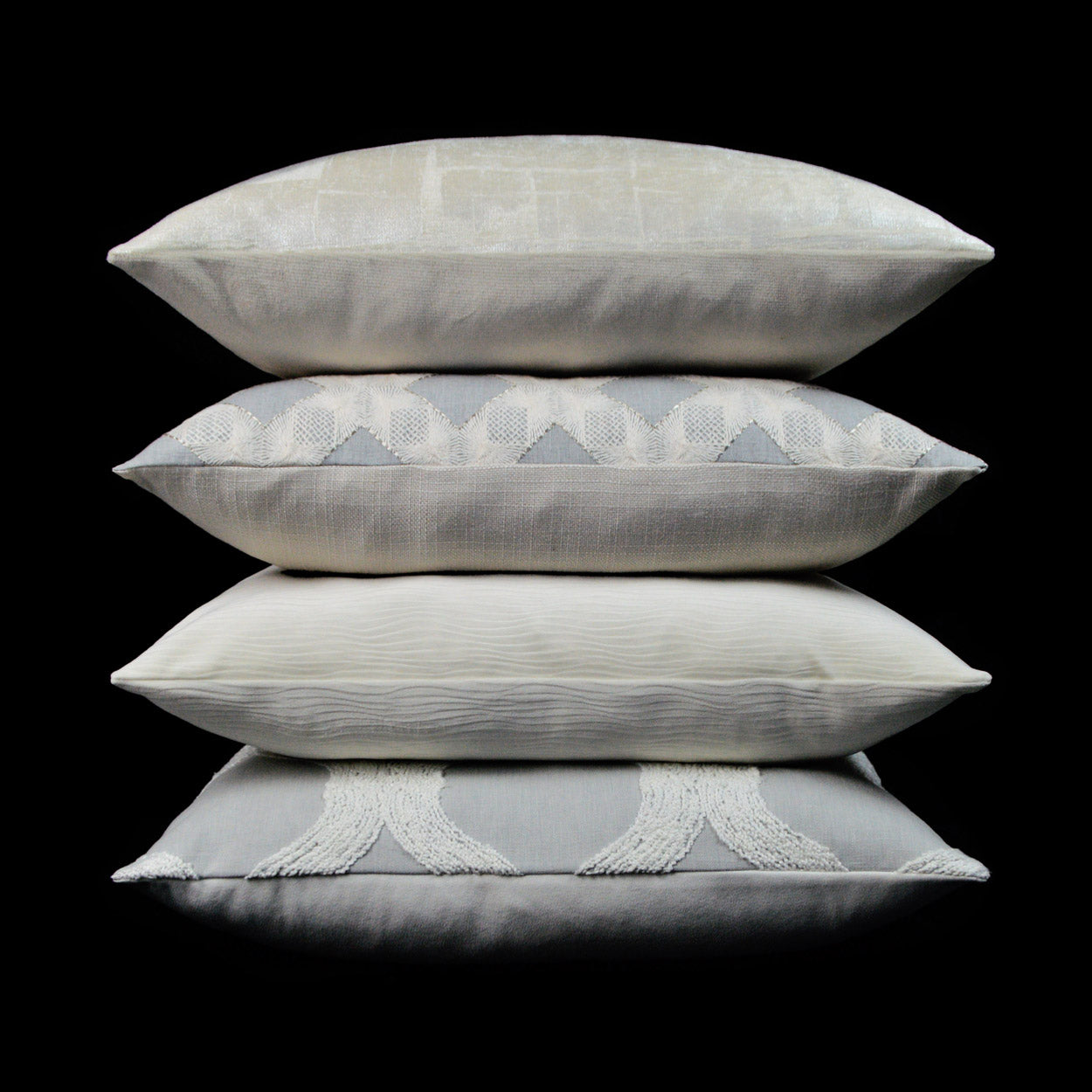 24" x 24" silver glam abstract pillow with subtle textures and tassel-trim detail