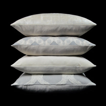 24" x 24" silver glam abstract pillow with subtle textures and tassel-trim detail