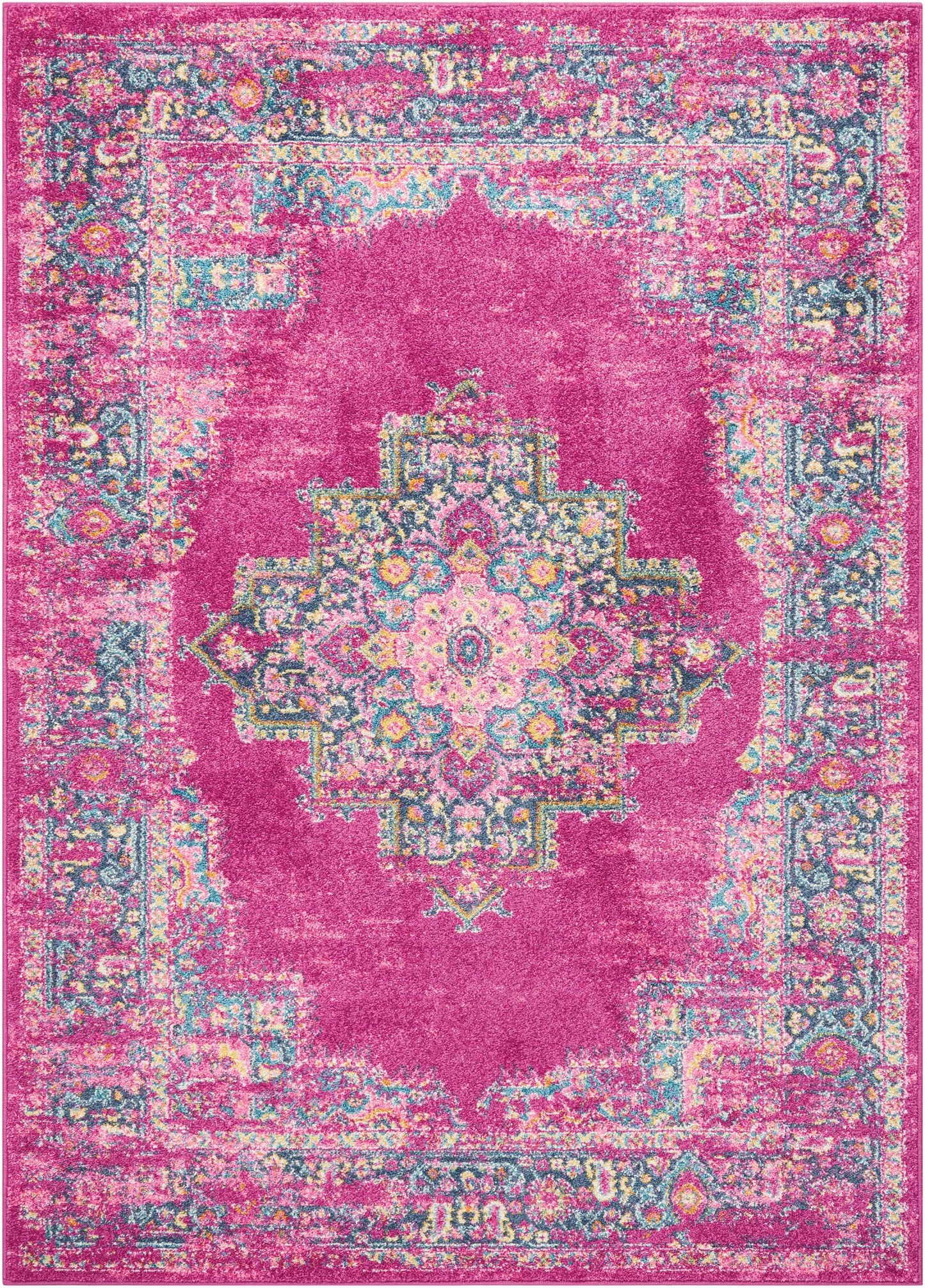 Bright pink oriental rug with a detailed central medallion in teal, yellow and cream; decorative patterned border.