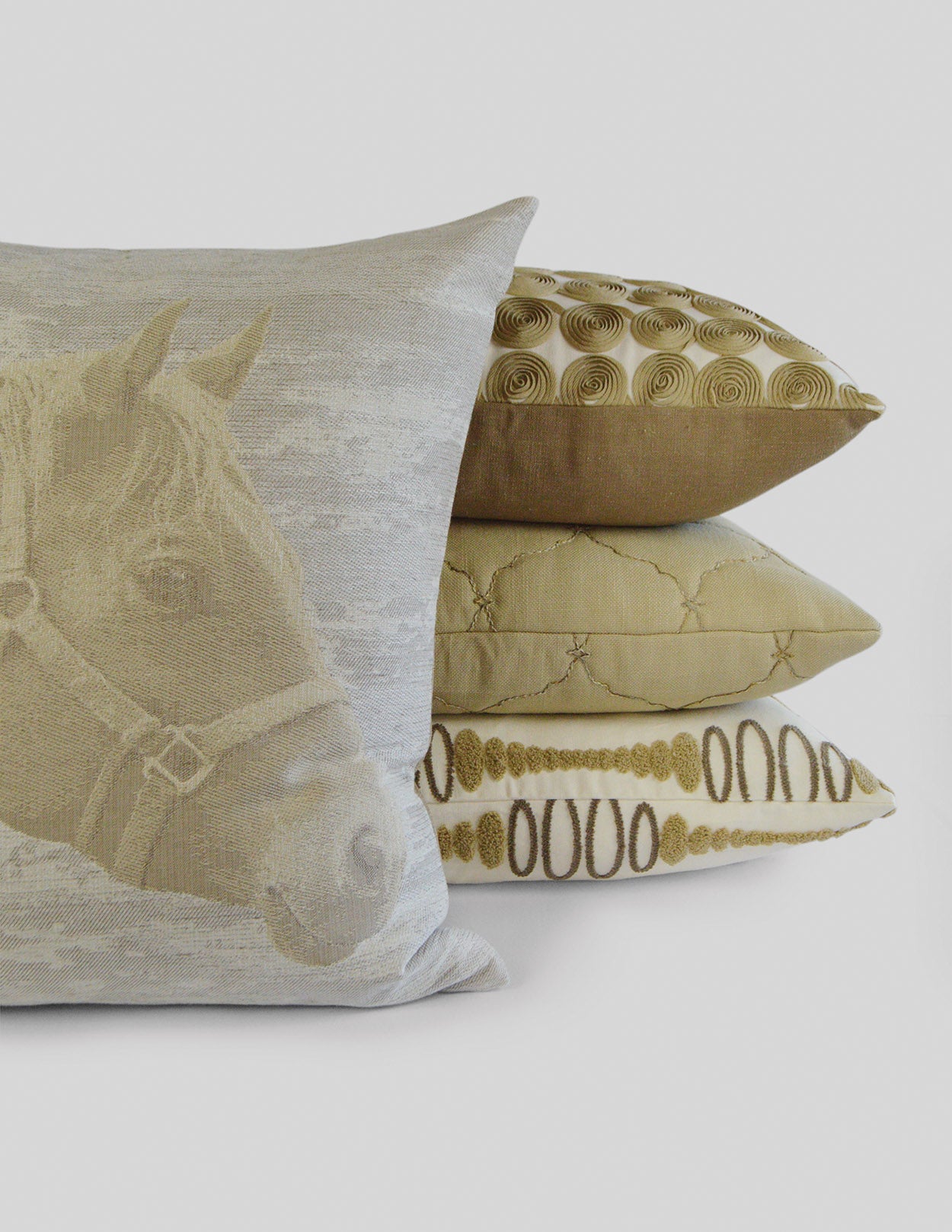 Ivory Mister Ed pillow featuring a gold horse silhouette.