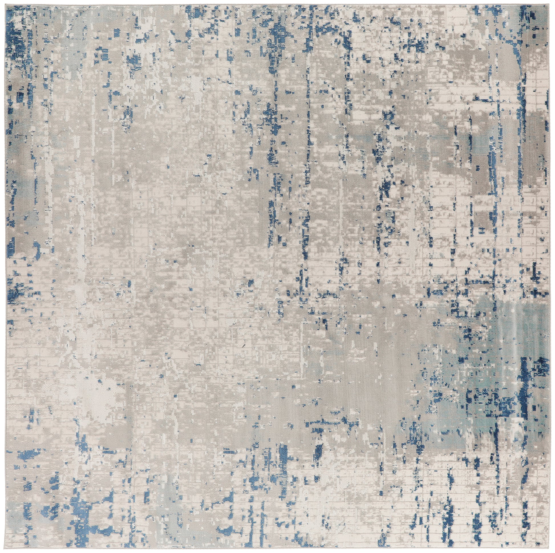 Abstract distressed beige and blue area rug with painterly textures for modern contemporary floor decor.