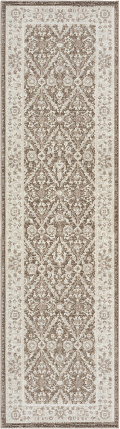 Rectangular oriental-style rug in cream and taupe with a repeating floral damask in the center and bordered edges.