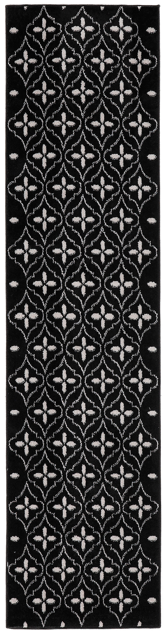 Black rectangular runner rug with white geometric quatrefoil lattice pattern along its length.