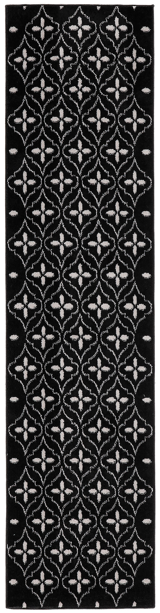 Black rectangular runner rug with white geometric quatrefoil lattice pattern along its length.