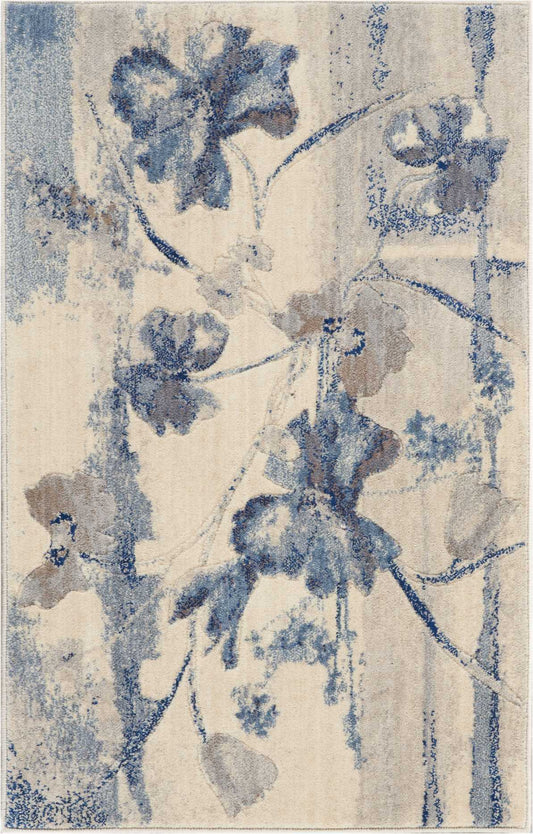Blue floral vine area rug with ivory background; abstract botanical design, plush pile, rectangular decor rug.
