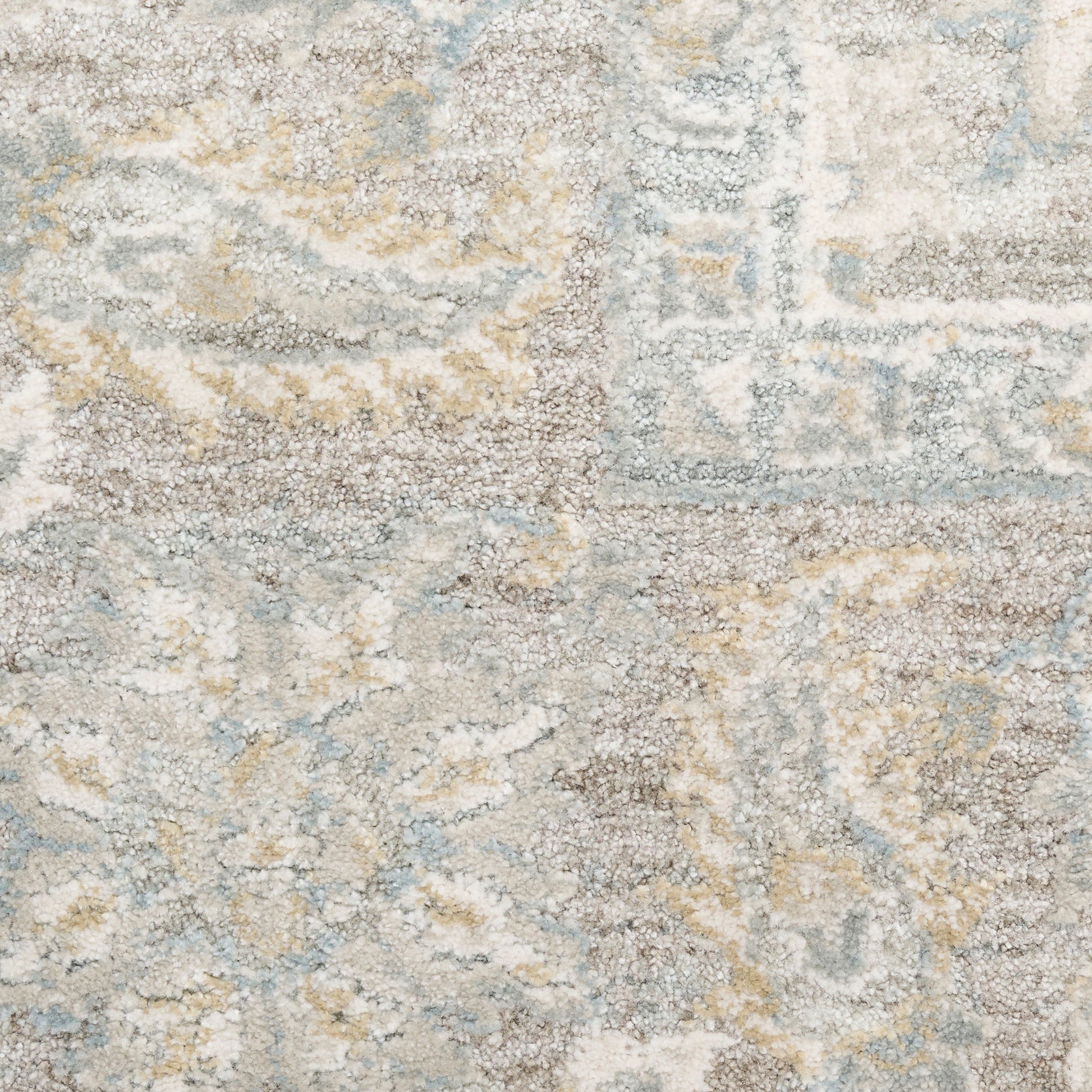 Neutral-toned abstract area rug with pale blue, beige, taupe and gray hues in a distressed pattern, low-pile.