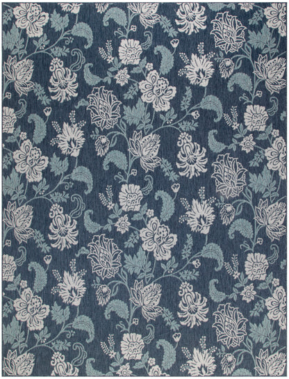 Navy blue textile with light gray ornate floral damask pattern featuring scrolling roses and leaves.