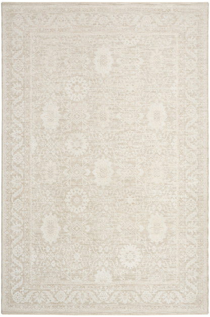 Cream ivory oriental-style rug with a subtle floral medallion pattern and decorative border; neutral, classic decor.