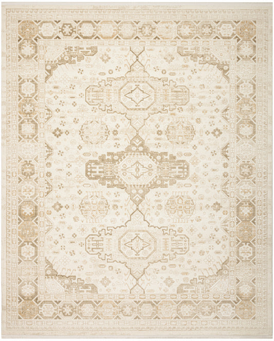 Cream and taupe Persian-style area rug with distressed geometric medallions and ornate border.