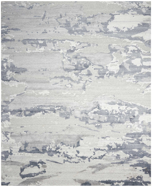 Abstract gray and ivory area rug with a weathered, brushstroke pattern; soft, low-pile contemporary decor.