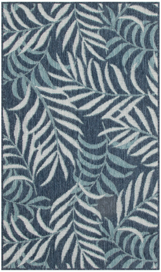 Blue rug with white and light blue fern leaf pattern, rectangular woven textile.