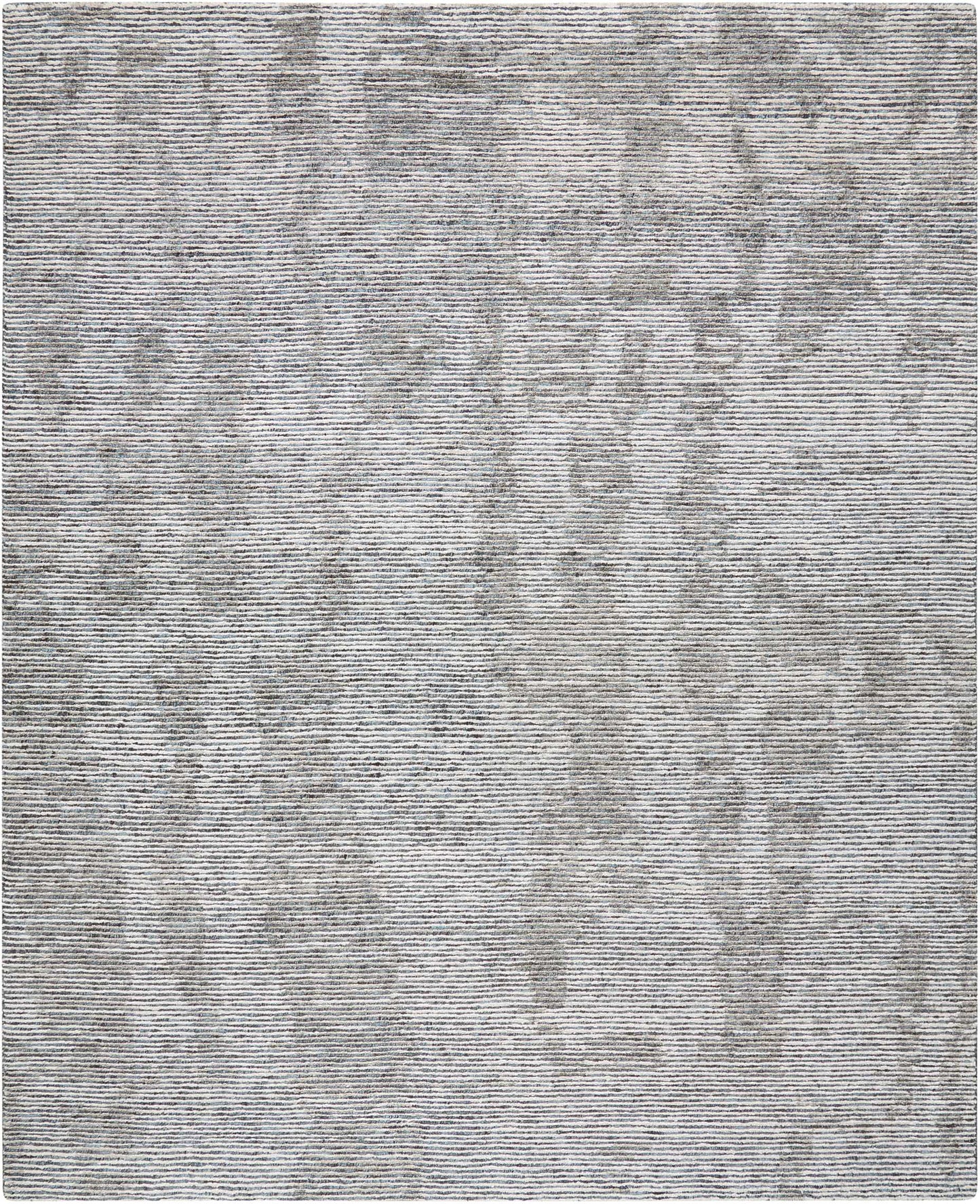 Light gray flatweave rug with a subtle abstract floral pattern; rectangular, versatile living-room decor.