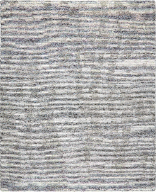 Light gray flatweave rug with a subtle abstract floral pattern; rectangular, versatile living-room decor.