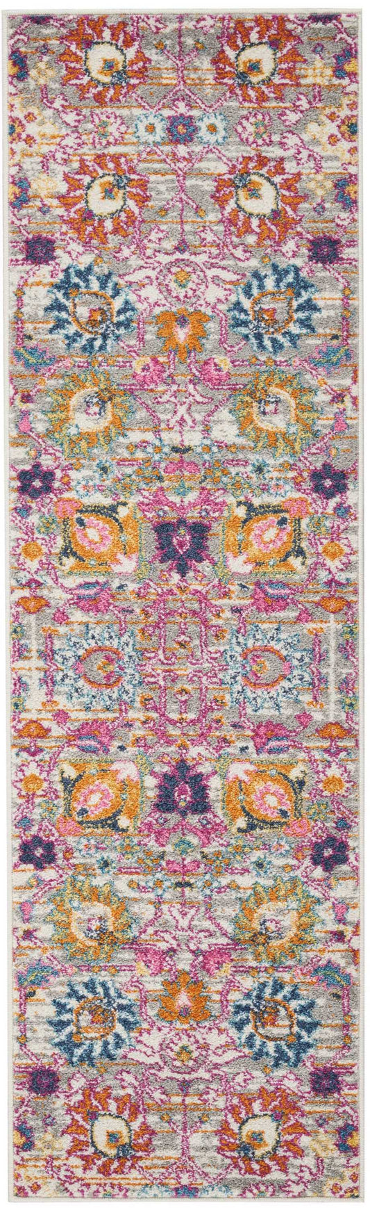 Long bohemian Persian-style runner rug with bright pink, orange, blue and yellow floral motifs on a gray background.