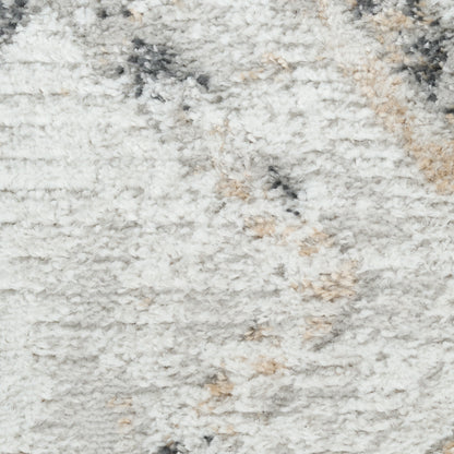 Soft, shaggy light gray rug with beige & charcoal specks; plush, modern textured area rug.