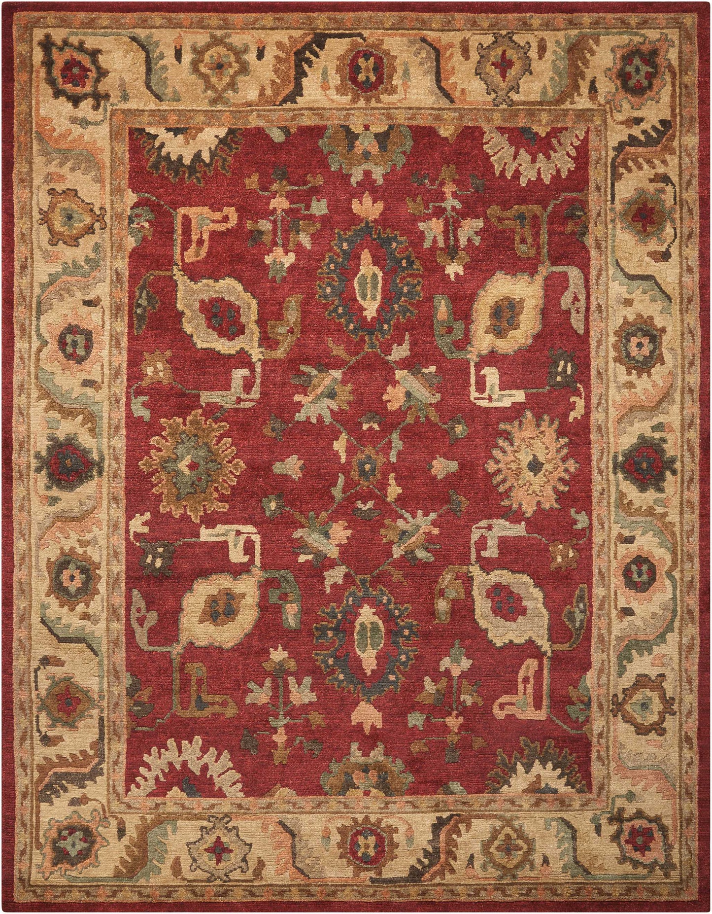 Rectangular Persian-style rug with deep red field, ivory border, and ornate floral motifs in teal, gold, and beige.