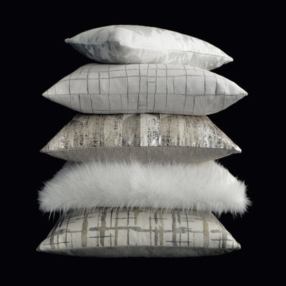 Stack of five decorative throw pillows in pewter gray tones with a grid pattern and metallic sheen.