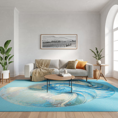 Cozy living room with gray sofa, beige throw, orange cushion, round wood coffee table, blue swirl rug, plants.